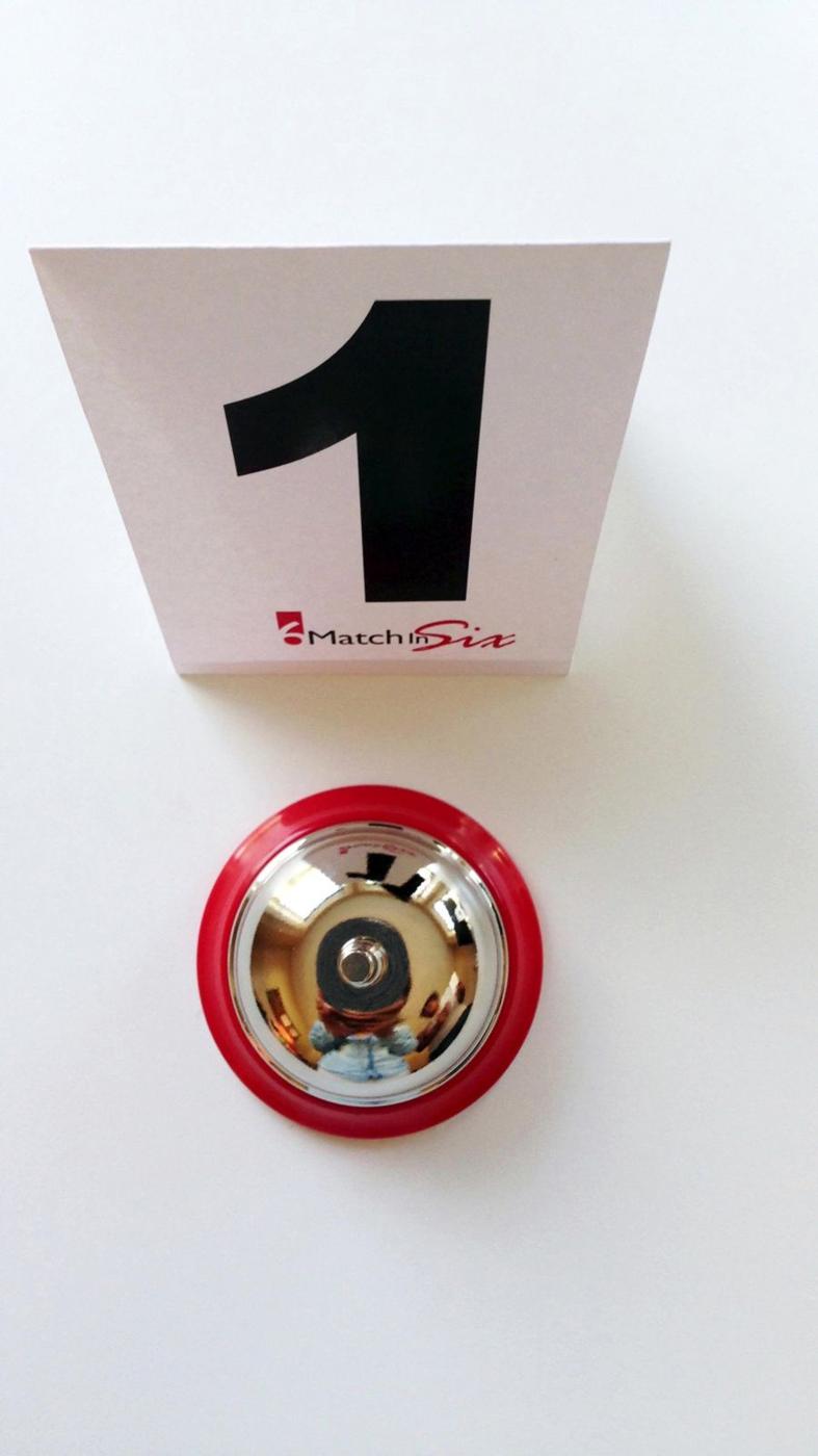 A Match in Six table number and the bell
